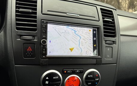 Nissan Tiida, 2010 год, 610 000 рублей, 14 фотография