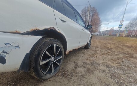 Mazda Familia, 1998 год, 170 000 рублей, 3 фотография