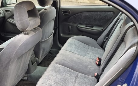 Toyota Avensis III рестайлинг, 2000 год, 290 000 рублей, 26 фотография