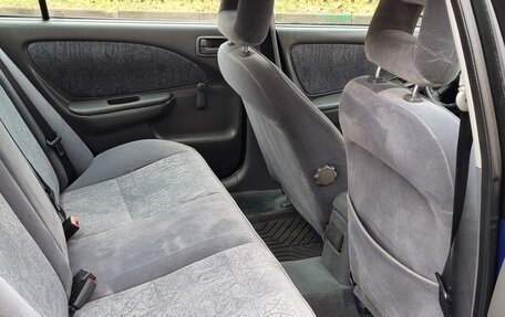 Toyota Avensis III рестайлинг, 2000 год, 290 000 рублей, 28 фотография