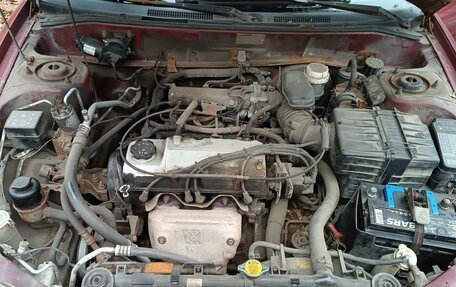 Mitsubishi Mirage VI рестайлинг, 1998 год, 220 000 рублей, 3 фотография