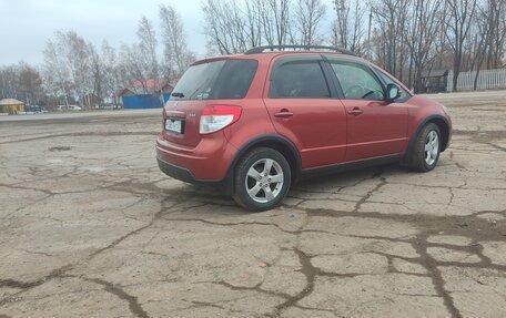 Suzuki SX4 II рестайлинг, 2009 год, 750 000 рублей, 11 фотография