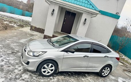 Hyundai Solaris II рестайлинг, 2011 год, 598 000 рублей, 17 фотография