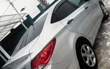 Hyundai Solaris II рестайлинг, 2011 год, 598 000 рублей, 22 фотография