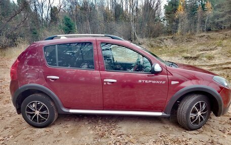 Renault Sandero I, 2013 год, 770 000 рублей, 2 фотография