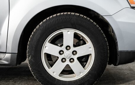 Mitsubishi Outlander III рестайлинг 3, 2011 год, 1 200 000 рублей, 16 фотография