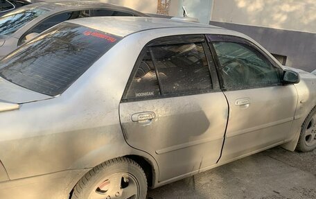 Ford Laser IV, 2003 год, 115 000 рублей, 2 фотография