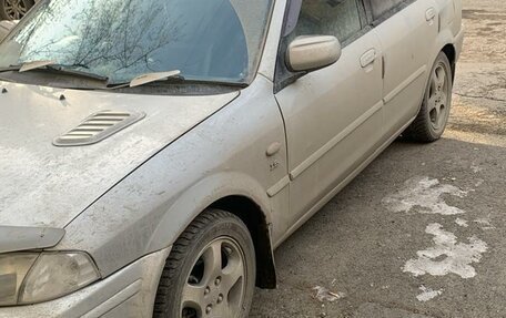 Ford Laser IV, 2003 год, 115 000 рублей, 4 фотография