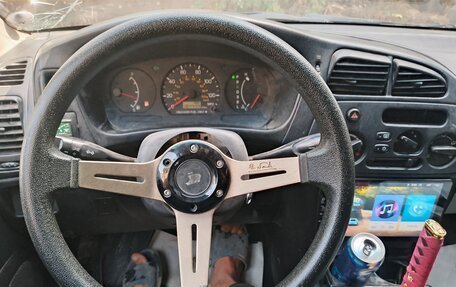 Mitsubishi Mirage VI рестайлинг, 1999 год, 80 000 рублей, 8 фотография