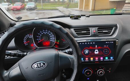 KIA Rio III рестайлинг, 2011 год, 650 000 рублей, 11 фотография