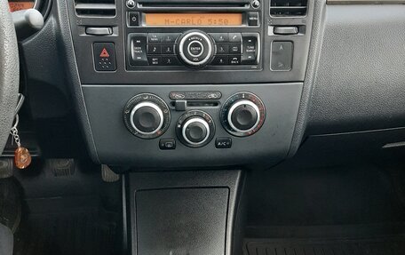 Nissan Tiida, 2010 год, 660 000 рублей, 9 фотография