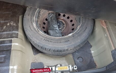 Nissan Tiida, 2010 год, 660 000 рублей, 13 фотография