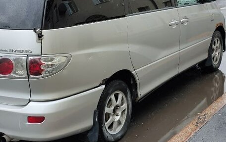 Toyota Estima III рестайлинг -2, 2004 год, 650 000 рублей, 2 фотография