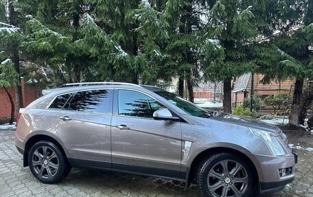 Cadillac SRX II рестайлинг, 2011 год, 1 600 000 рублей, 1 фотография