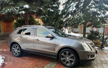 Cadillac SRX II рестайлинг, 2011 год, 1 600 000 рублей, 14 фотография