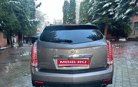 Cadillac SRX II рестайлинг, 2011 год, 1 600 000 рублей, 4 фотография
