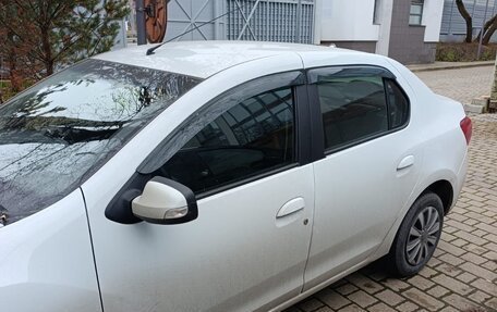 Renault Logan II, 2021 год, 1 050 000 рублей, 2 фотография