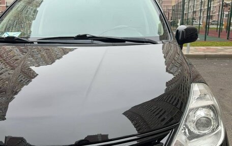 Nissan Tiida, 2010 год, 800 000 рублей, 9 фотография