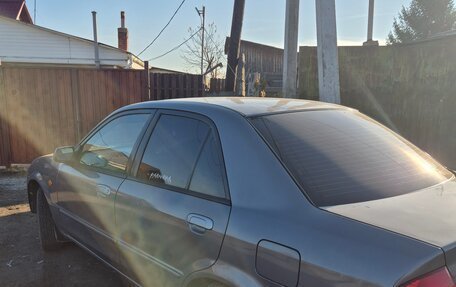 Mazda 323, 2003 год, 330 000 рублей, 5 фотография