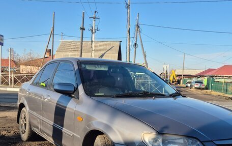 Mazda 323, 2003 год, 330 000 рублей, 8 фотография