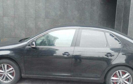 Volkswagen Jetta VI, 2009 год, 390 000 рублей, 6 фотография