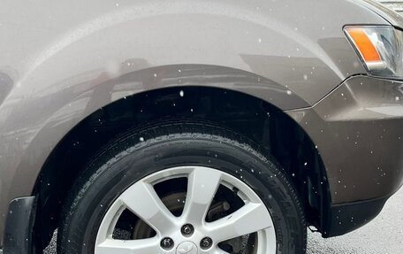 Mitsubishi Outlander III рестайлинг 3, 2011 год, 1 800 000 рублей, 10 фотография