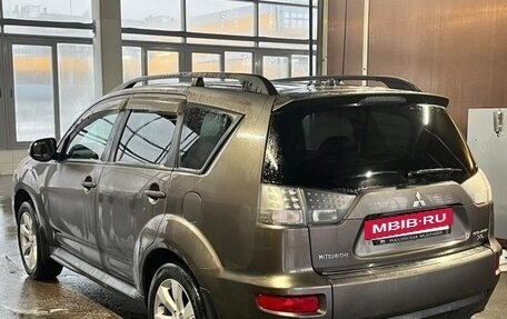 Mitsubishi Outlander III рестайлинг 3, 2011 год, 1 800 000 рублей, 13 фотография