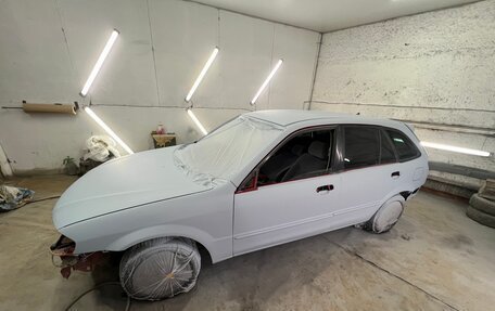 Mazda Familia, 2000 год, 350 000 рублей, 37 фотография