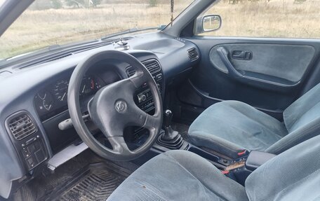 Nissan Primera II рестайлинг, 1991 год, 270 000 рублей, 5 фотография