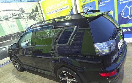 Mitsubishi Outlander III рестайлинг 3, 2012 год, 1 499 000 рублей, 4 фотография