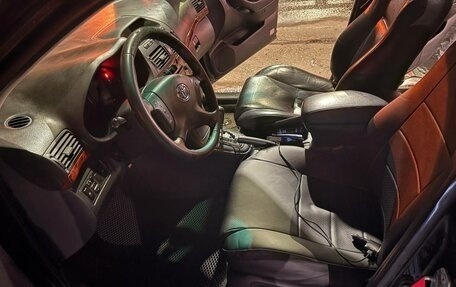 Toyota Avensis III рестайлинг, 2005 год, 600 000 рублей, 12 фотография