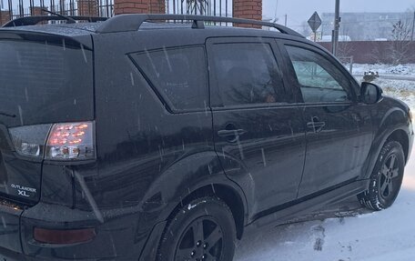 Mitsubishi Outlander III рестайлинг 3, 2011 год, 1 150 000 рублей, 4 фотография