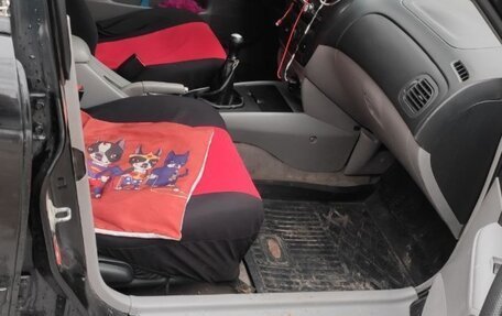 Mazda 323, 2002 год, 155 000 рублей, 9 фотография