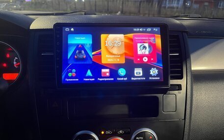 Nissan Tiida, 2010 год, 750 000 рублей, 8 фотография