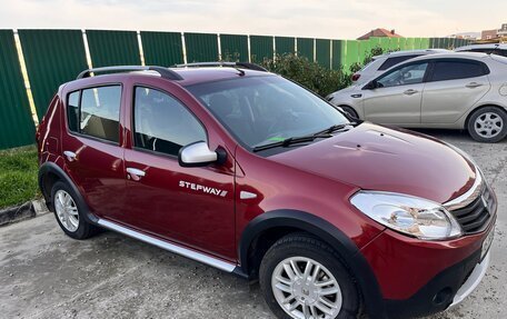 Renault Sandero I, 2012 год, 649 000 рублей, 2 фотография