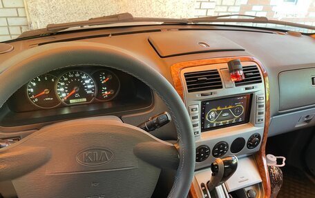 KIA Carnival III, 2005 год, 650 000 рублей, 11 фотография