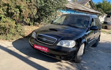 KIA Carnival III, 2005 год, 650 000 рублей, 2 фотография