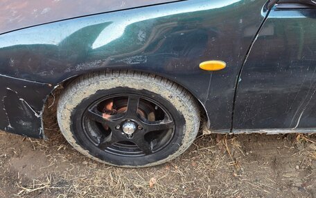 Mazda 323, 1994 год, 170 000 рублей, 4 фотография