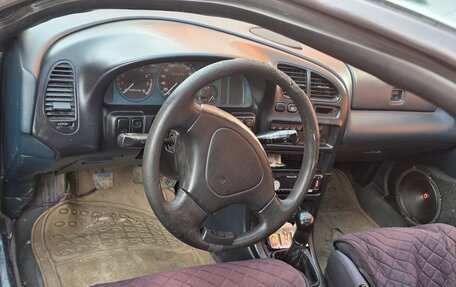 Mazda 323, 1994 год, 170 000 рублей, 5 фотография