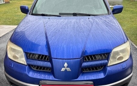 Mitsubishi Outlander III рестайлинг 3, 2004 год, 420 000 рублей, 23 фотография