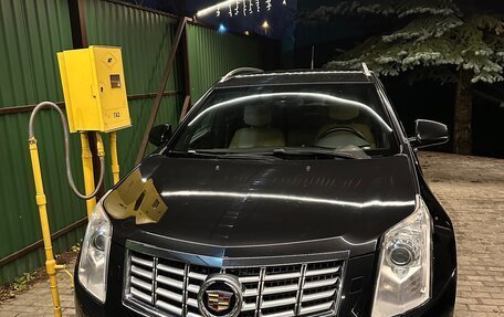 Cadillac SRX II рестайлинг, 2014 год, 2 200 000 рублей, 1 фотография