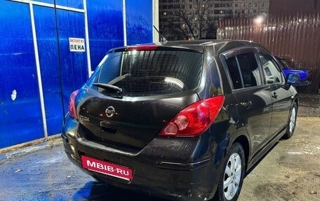 Nissan Tiida, 2011 год, 990 000 рублей, 38 фотография