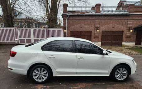 Volkswagen Jetta VI, 2013 год, 970 000 рублей, 4 фотография