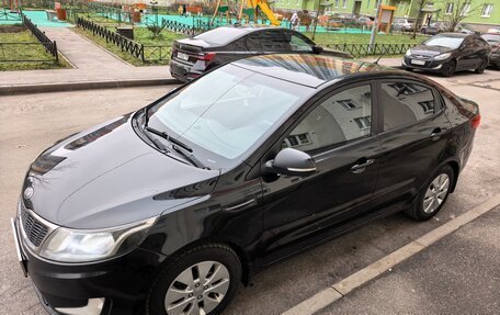 KIA Rio III рестайлинг, 2013 год, 690 000 рублей, 2 фотография