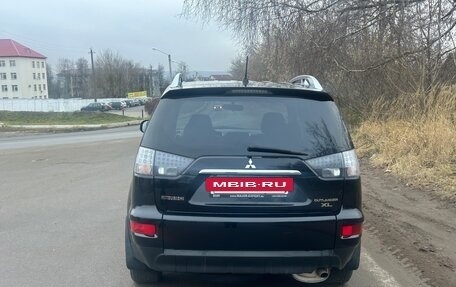 Mitsubishi Outlander III рестайлинг 3, 2010 год, 990 000 рублей, 4 фотография