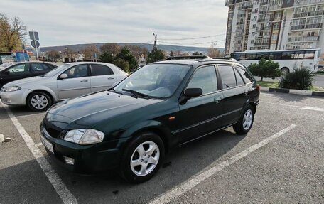 Mazda 323, 2000 год, 200 000 рублей, 17 фотография
