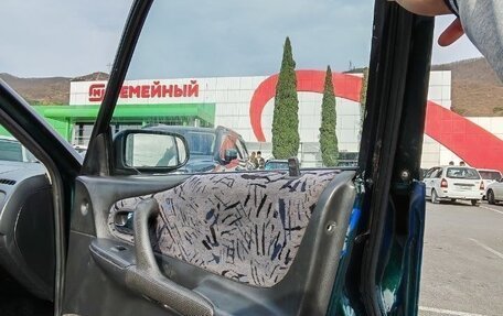 Mazda 323, 2000 год, 200 000 рублей, 24 фотография