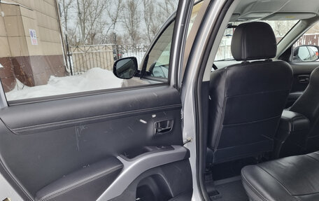 Mitsubishi Outlander III рестайлинг 3, 2011 год, 1 650 000 рублей, 10 фотография