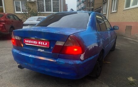 Mitsubishi Lancer VII, 1998 год, 170 000 рублей, 3 фотография