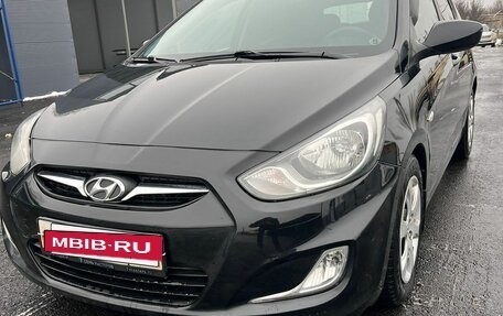 Hyundai Solaris II рестайлинг, 2011 год, 775 000 рублей, 2 фотография